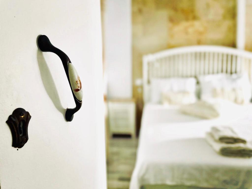 A bed or beds in a room at Nonna Cannella