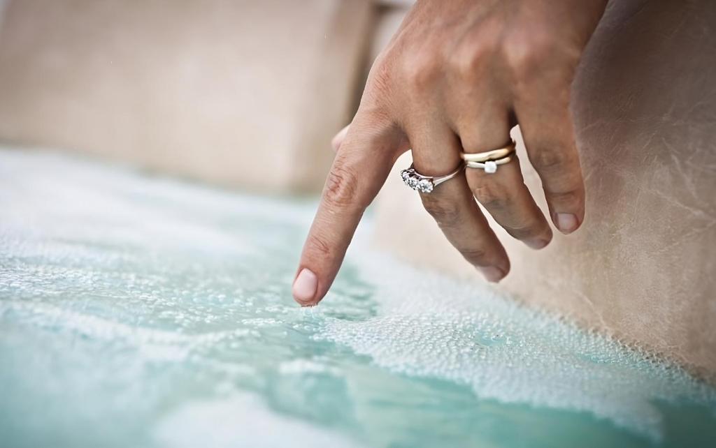 a woman wearing a engagement ring on her finger at Casetta Zio Franco in Polignano a Mare