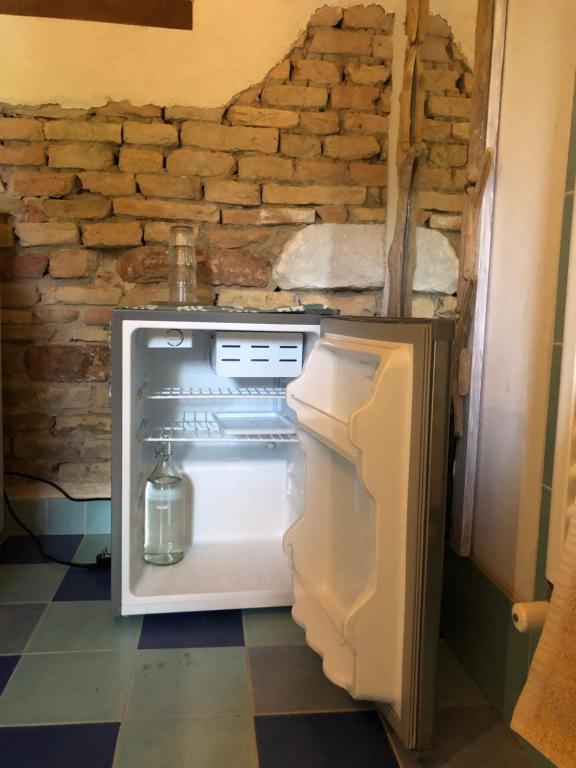 Postel nebo postele na pokoji v ubytování Ca' Barbona