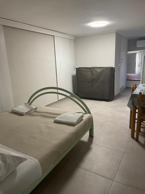 Postel nebo postele na pokoji v ubytování SOPRAMARE BB - APPARTAMENTI
