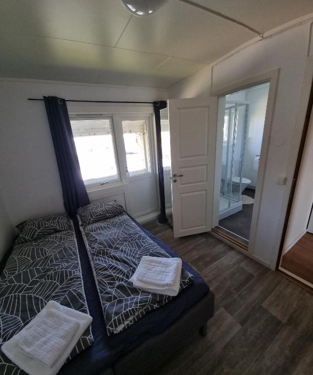 Postel nebo postele na pokoji v ubytování Sleep In