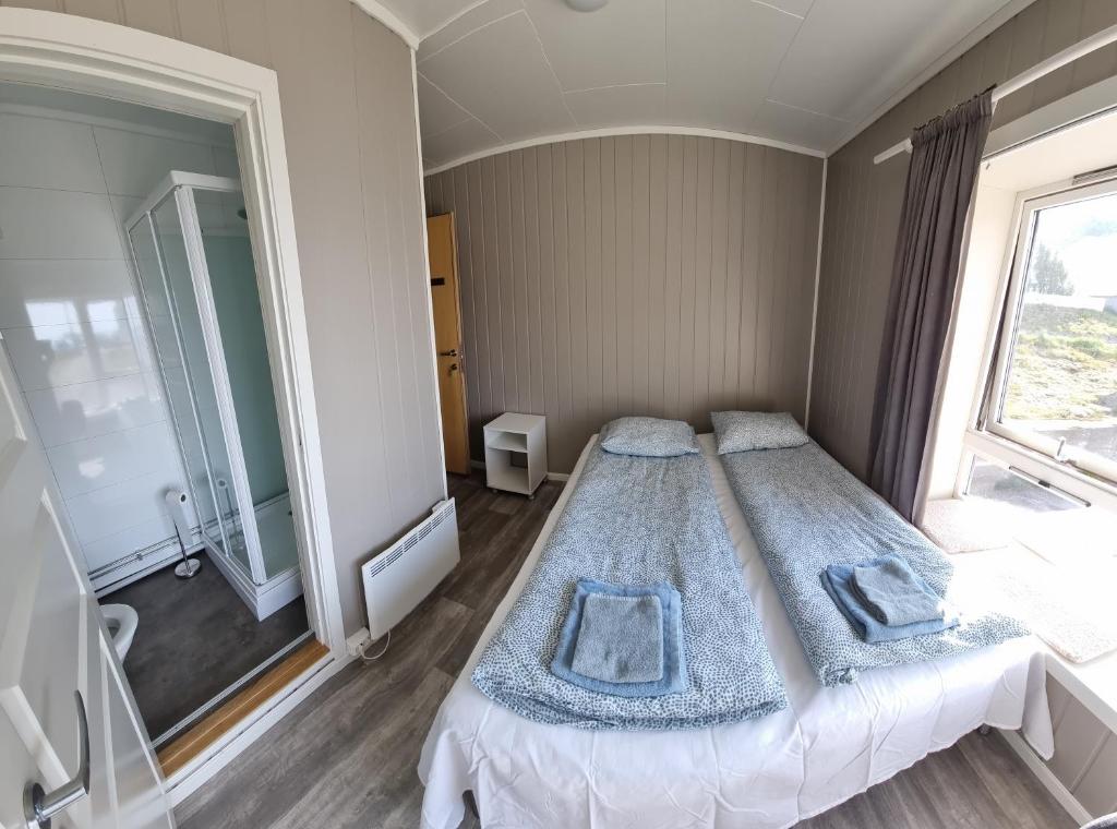 Postel nebo postele na pokoji v ubytování Sleep In