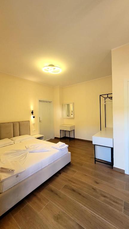 Postel nebo postele na pokoji v ubytování Sweet Home Himara
