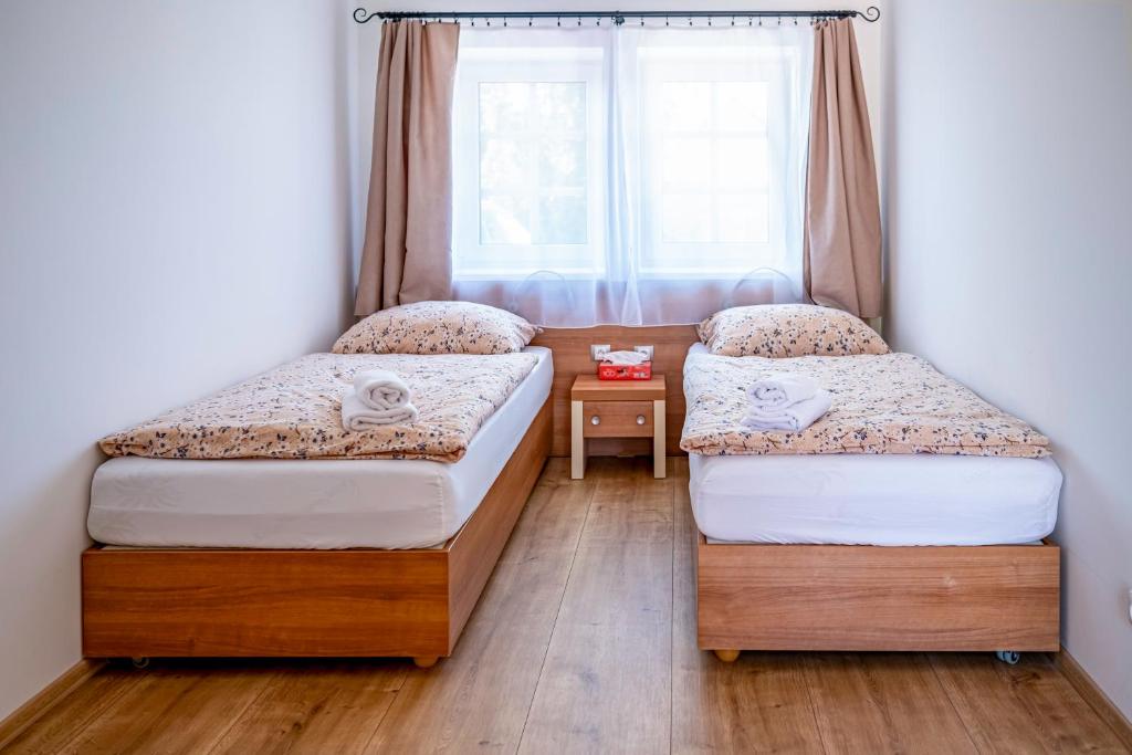 Postelja oz. postelje v sobi nastanitve U Katalpy