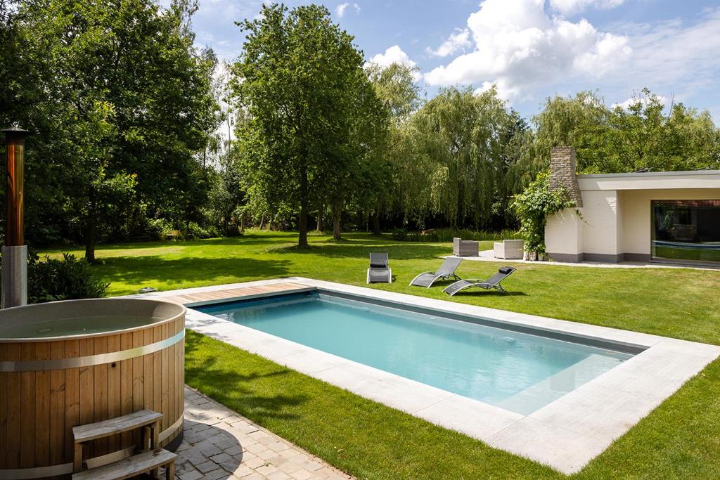 Bazén v ubytování Vakantiewoning Blijbos nebo v jeho okolí