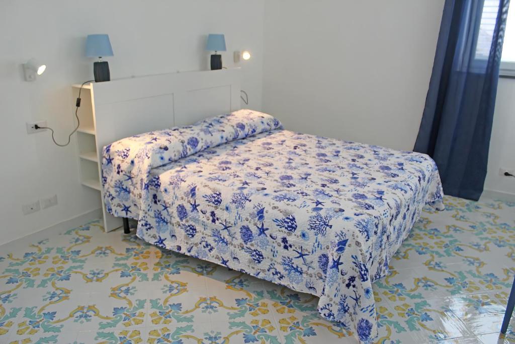Postel nebo postele na pokoji v ubytování B&B Casa Angelina