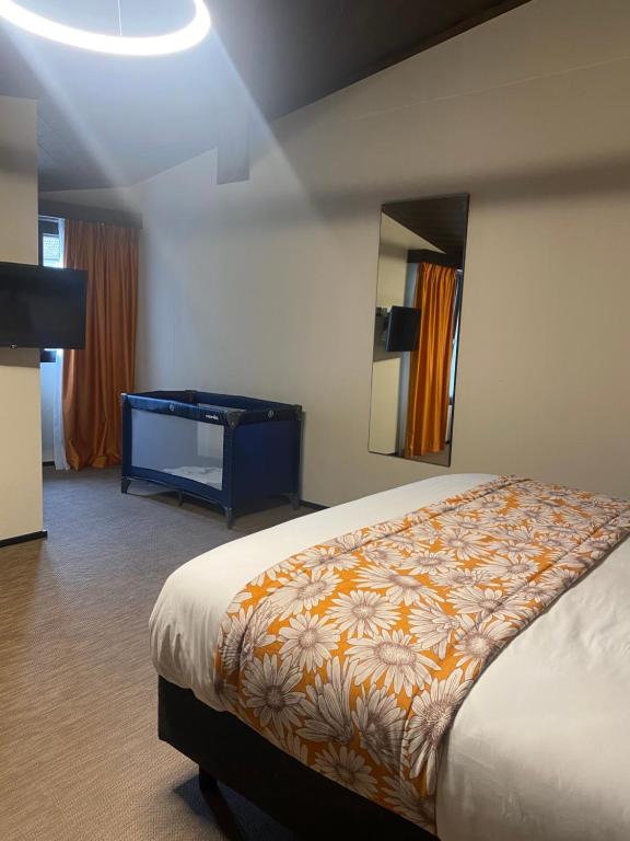 Postel nebo postele na pokoji v ubytování Kza Jura Swiss