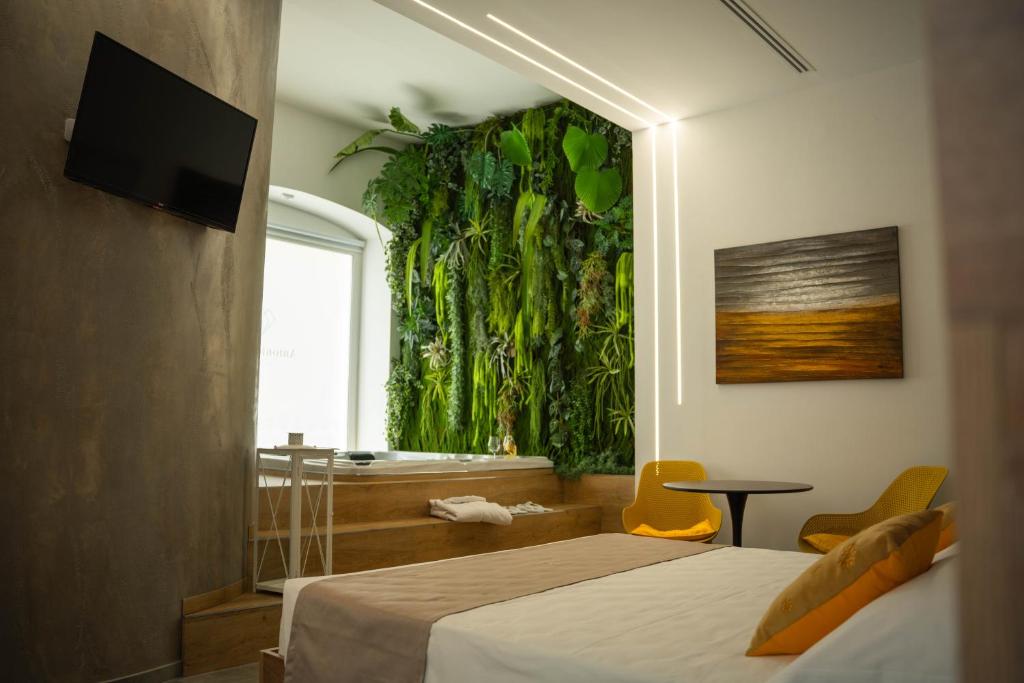 Postel nebo postele na pokoji v ubytování Antonio Busco rooms