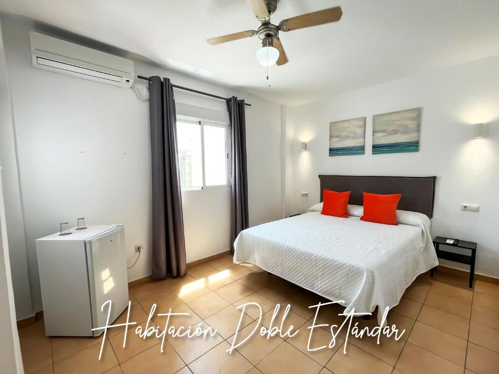 Posteľ alebo postele v izbe v ubytovaní Micaela Charming Hostal
