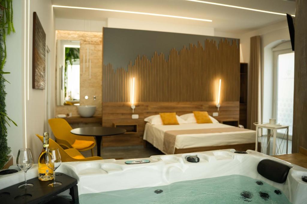 Postel nebo postele na pokoji v ubytování Antonio Busco rooms