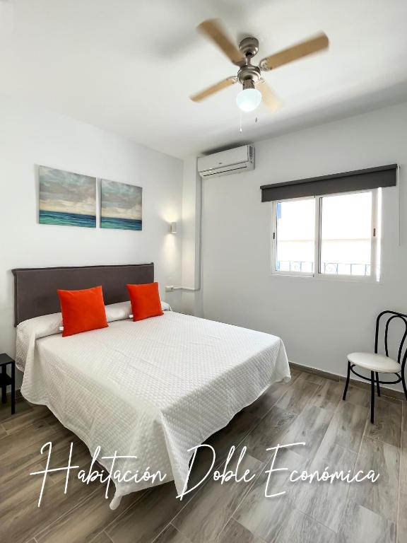 Posteľ alebo postele v izbe v ubytovaní Micaela Charming Hostal