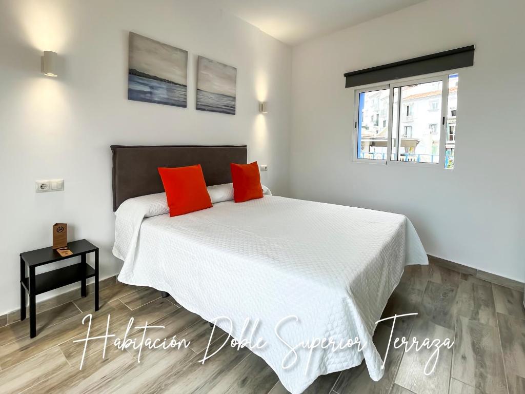 Posteľ alebo postele v izbe v ubytovaní Micaela Charming Hostal