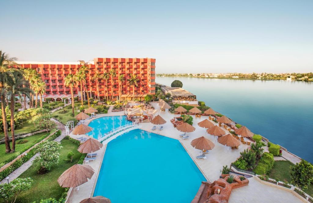 an aerial view of the pool at the resort at Pyramisa Hotel Luxor in Luxor