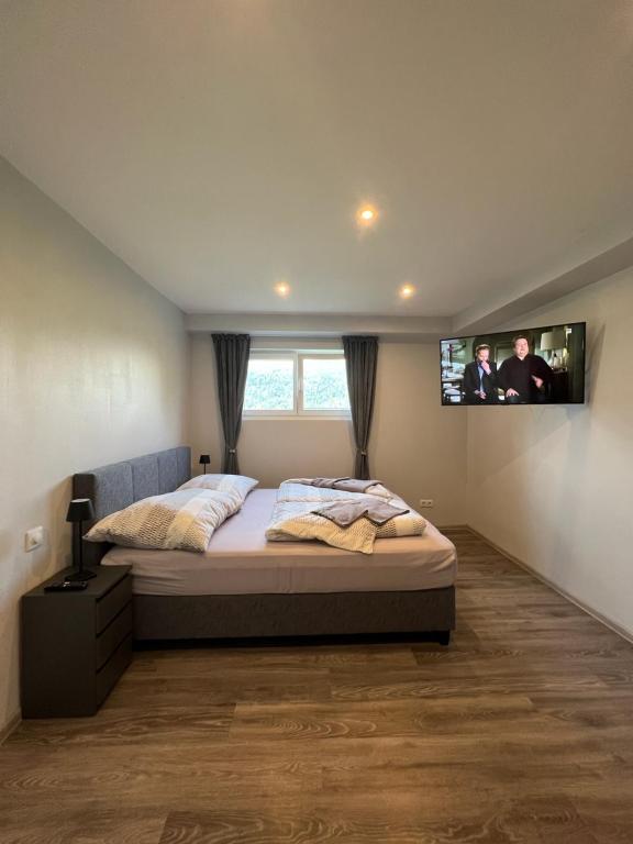 Postel nebo postele na pokoji v ubytování FRESH Apartments
