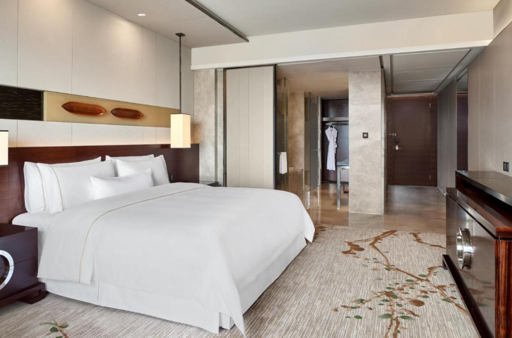 Postel nebo postele na pokoji v ubytování The Westin Pazhou