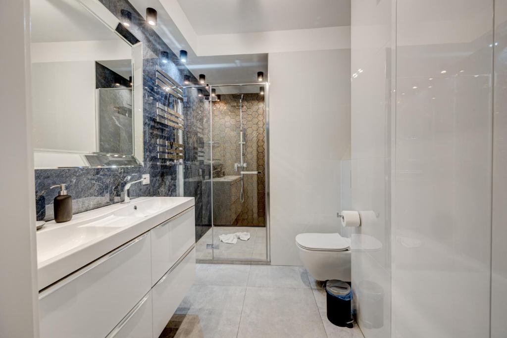 Kúpeľňa v ubytovaní MALAGA APARTAMENTY BALTICUS