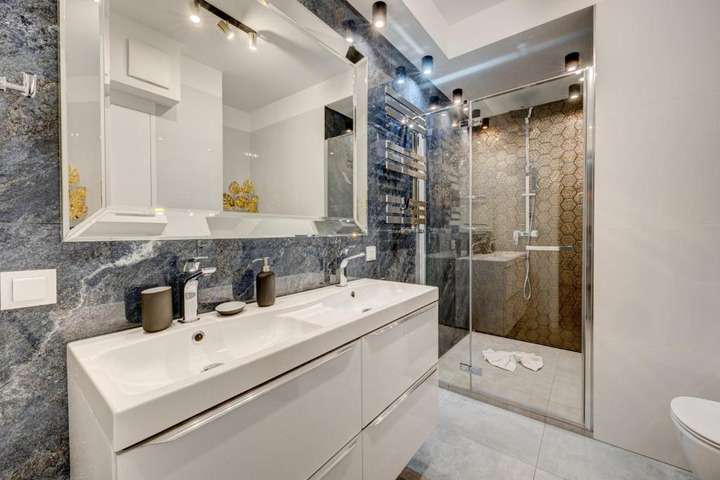 Kúpeľňa v ubytovaní MALAGA APARTAMENTY BALTICUS