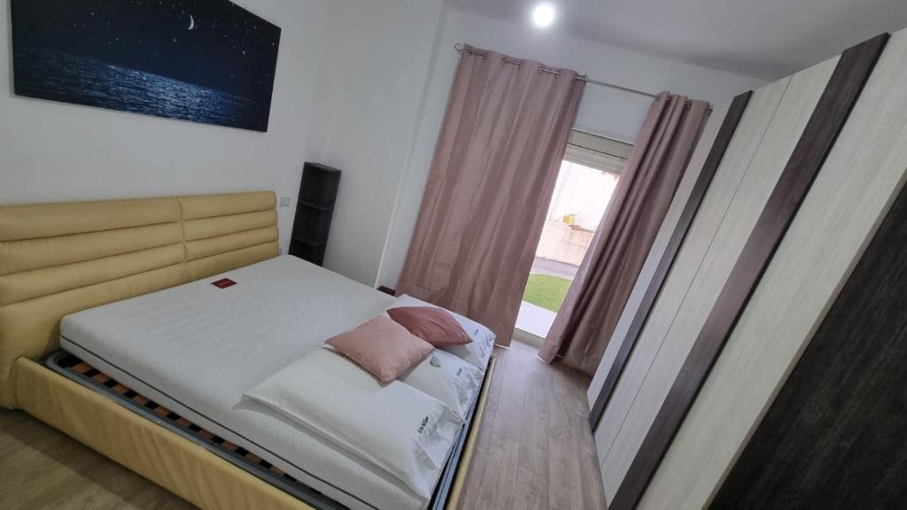 Postel nebo postele na pokoji v ubytování LA PACE DEGLI AGRUMI