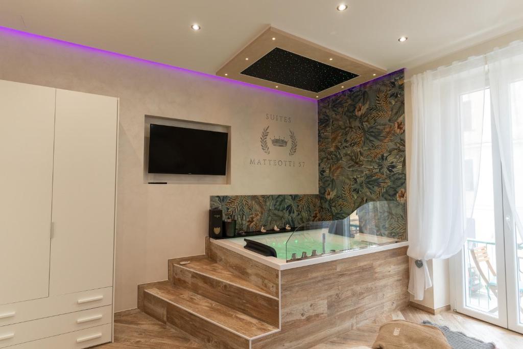 TV a/nebo společenská místnost v ubytování Suites Matteotti 57