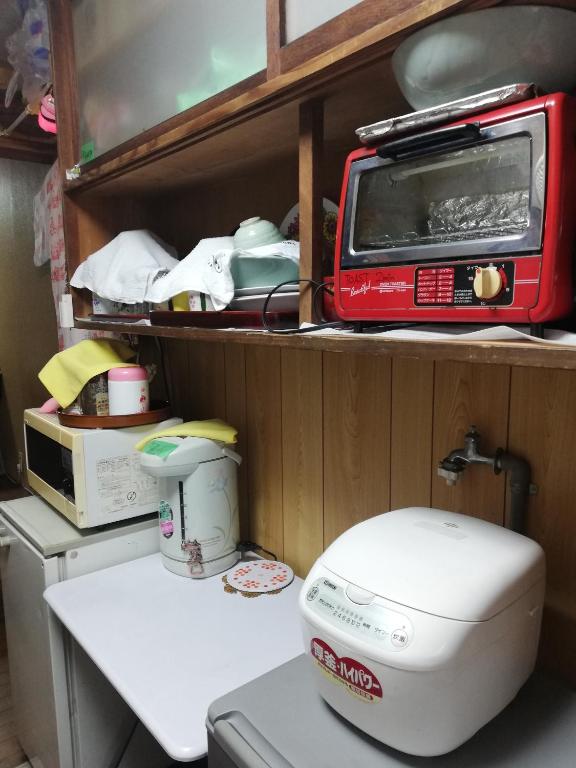 Kuchyň nebo kuchyňský kout v ubytování Guesthouse Kotohira