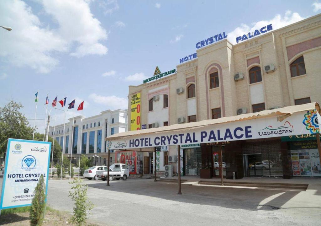 a street in a city with a hotel civil palace at Hotel crystal palace in Urganch