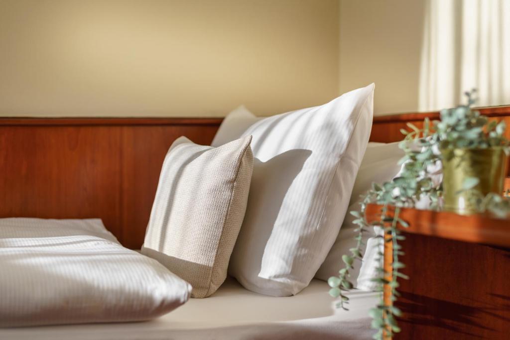 Postel nebo postele na pokoji v ubytování Hotel Hagemann Hamburg Hafen