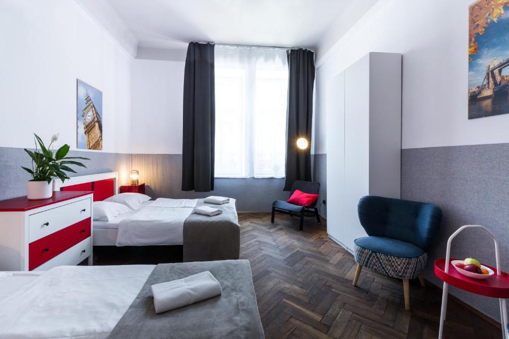 Postel nebo postele na pokoji v ubytování Kazimierz Friendhouse Apartments
