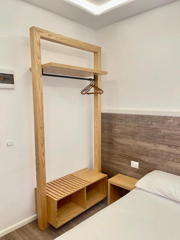 Uma cama ou camas num quarto em Hotel Aulona