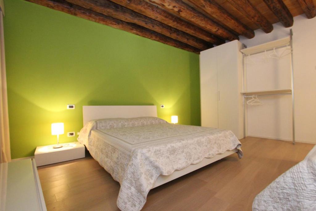 Posteľ alebo postele v izbe v ubytovaní City Apartments Rialto Market