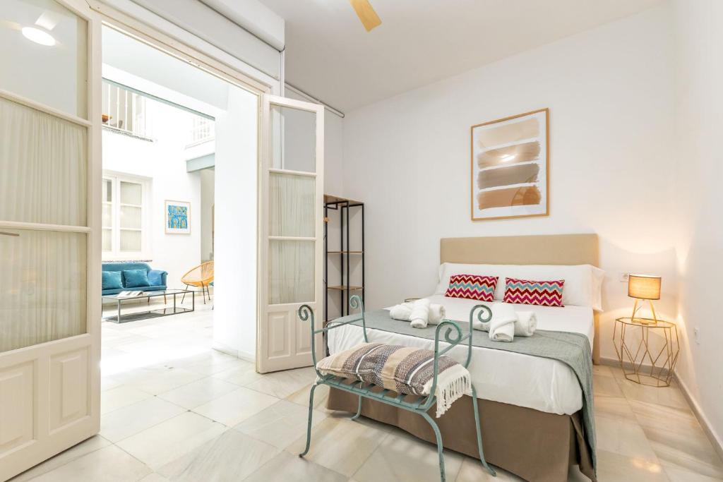 Postel nebo postele na pokoji v ubytování Casa en el Centro de Sevilla