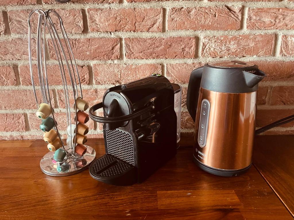 Coffee and tea making facilities at Juls Apartment next to football and hockey stadium