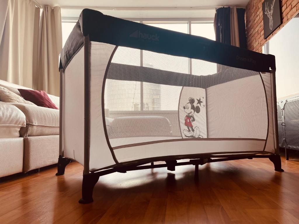 A bed or beds in a room at Juls Apartment next to football and hockey stadium