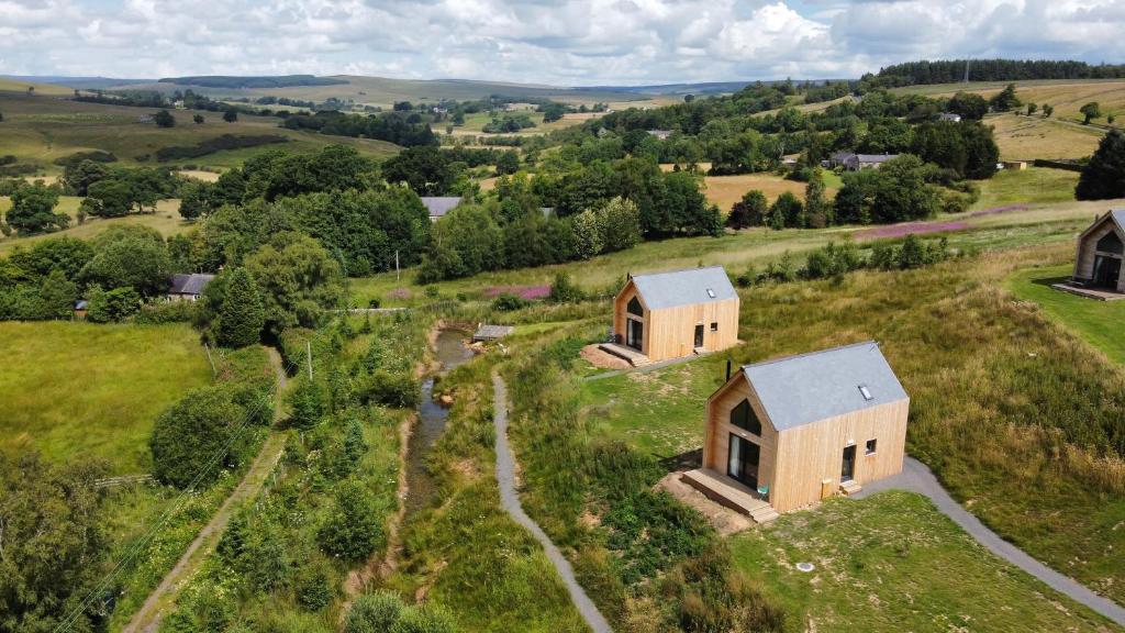 an aerial view of a house in a field at Tarset Tor - Bothy Cabin 5 in Hexham