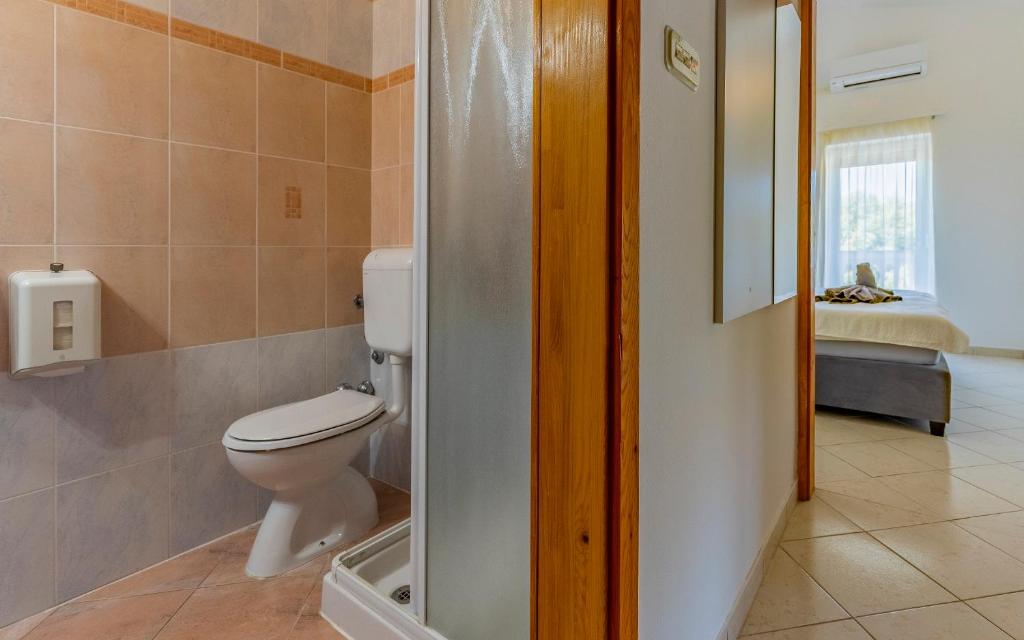 Koupelna v ubytování Apartments Rok