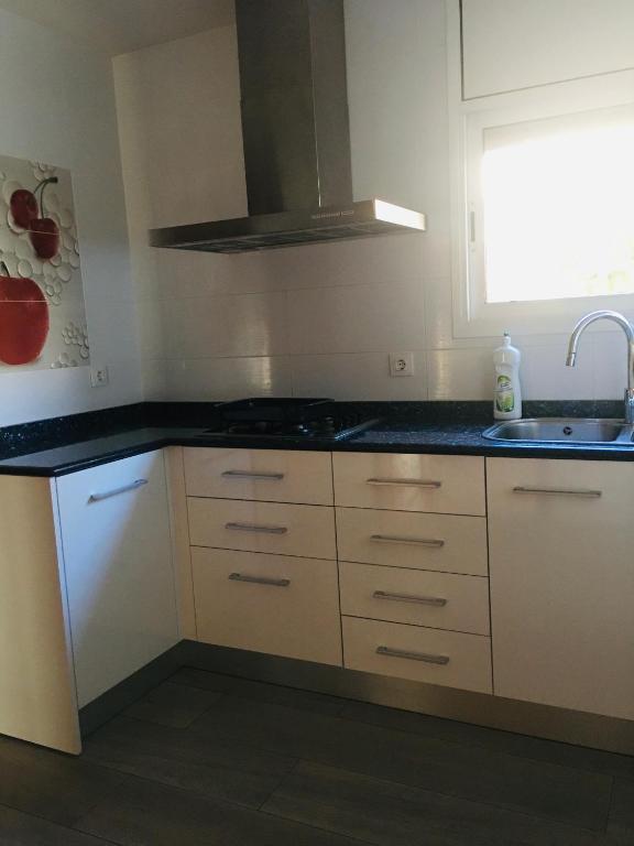 Kuchyň nebo kuchyňský kout v ubytování Casa de Aurora