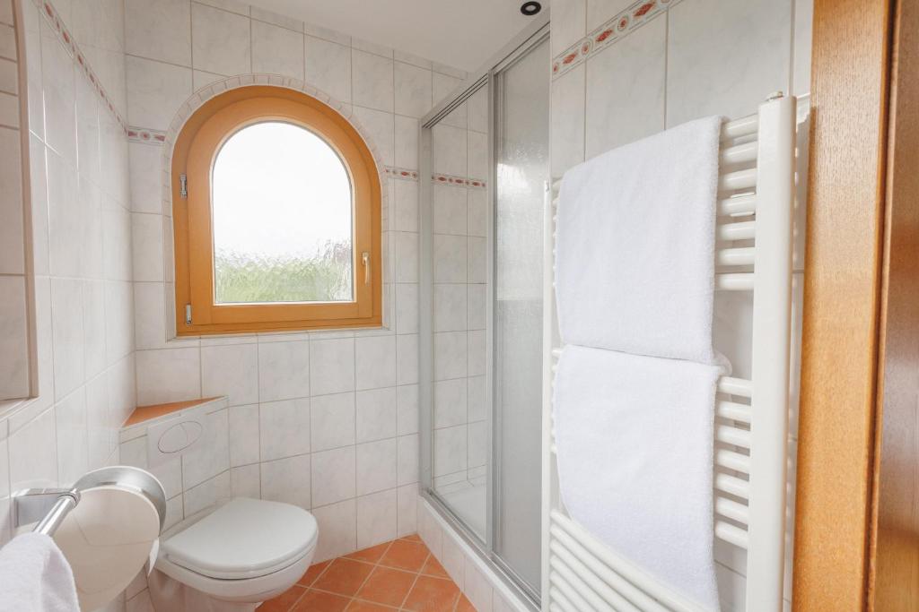 Koupelna v ubytování hin&weg das Aparthotel