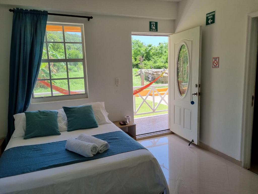 Postel nebo postele na pokoji v ubytování Shell Sea B & B