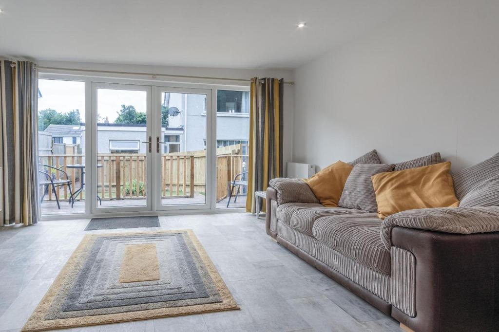 Posezení v ubytování The Garden Lodge - 1 Bedroom Lodge - Tenby
