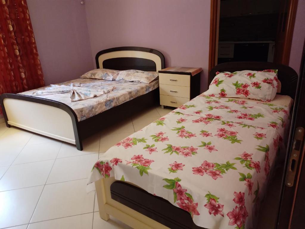 Postel nebo postele na pokoji v ubytování PARADISE VILLA