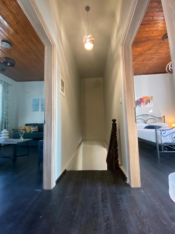Кровать или кровати в номере Aphrodite Apartments
