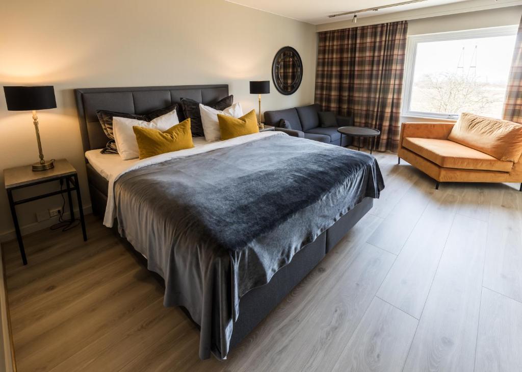 Postel nebo postele na pokoji v ubytování Klækken Hotel