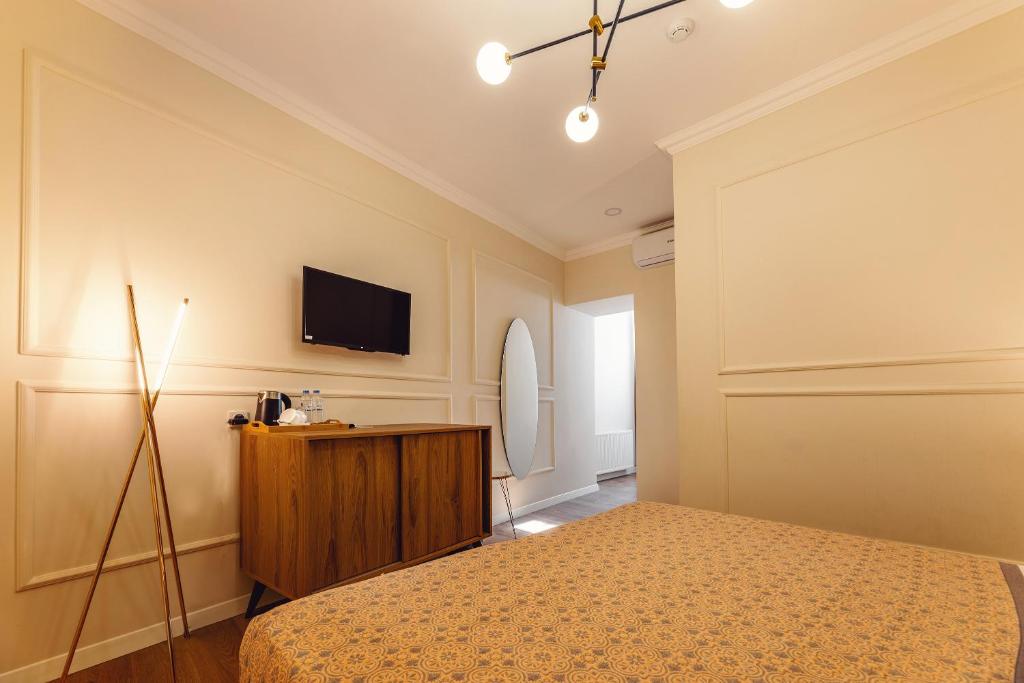 TV a/nebo společenská místnost v ubytování Boutique Hotel Manufactura