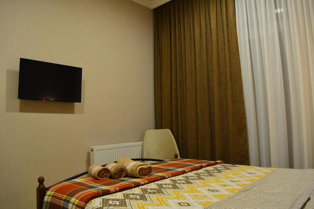 TV a/nebo společenská místnost v ubytování Velio Guest House