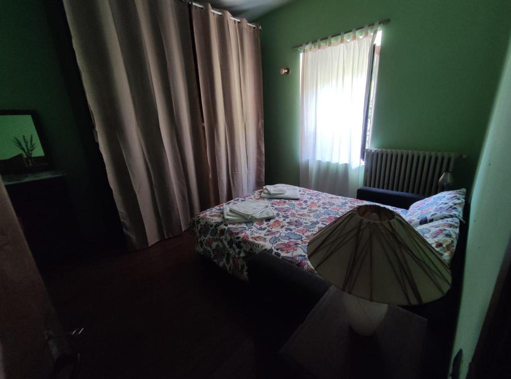 Łóżko lub łóżka w pokoju w obiekcie B&B Da Dodo'
