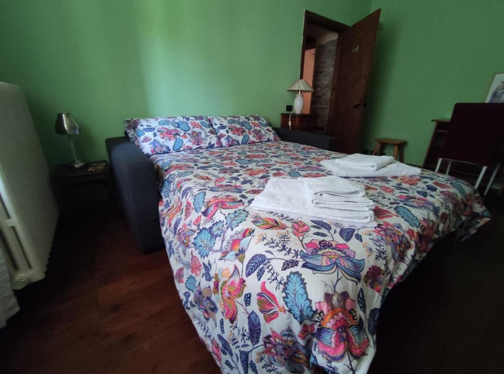 Łóżko lub łóżka w pokoju w obiekcie B&B Da Dodo'