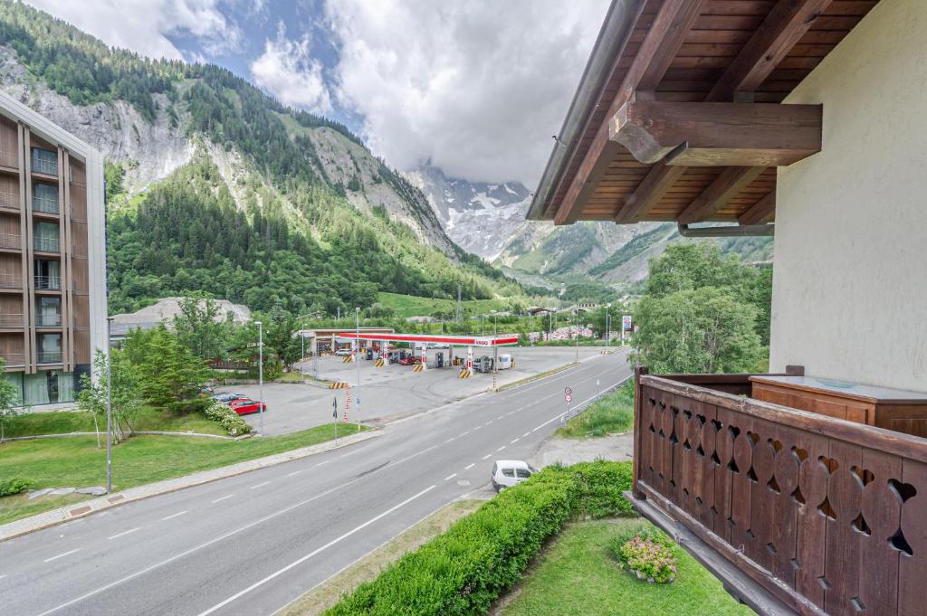 a view from a balcony of a building and a street at Casa Beatrice in Courmayeur