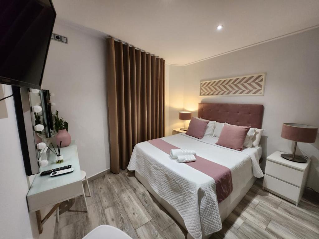 Postel nebo postele na pokoji v ubytování DON LEONE Hotel