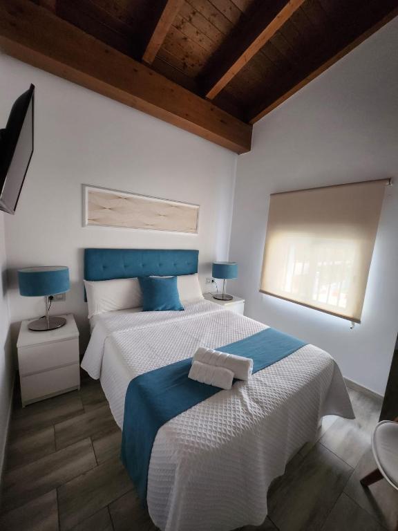 Postel nebo postele na pokoji v ubytování DON LEONE Hotel