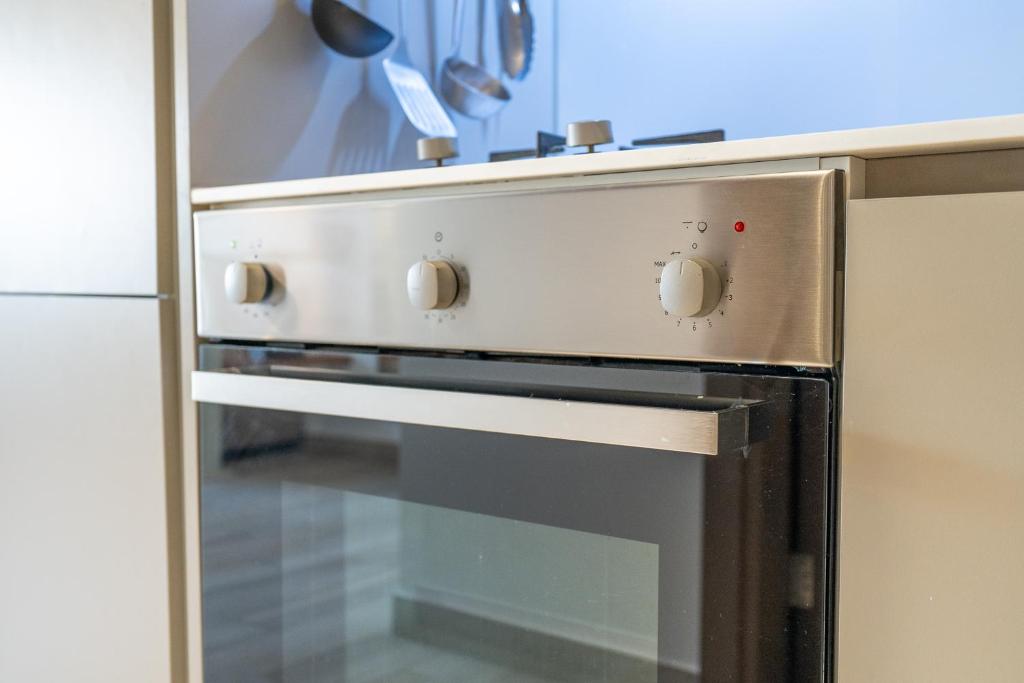 Kuchyň nebo kuchyňský kout v ubytování Unique loft with smart working station