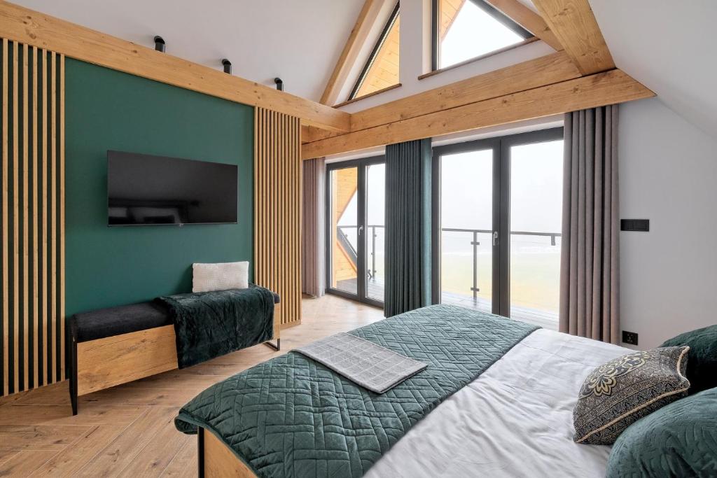 Postel nebo postele na pokoji v ubytování Domek Panorama z Jacuzzi